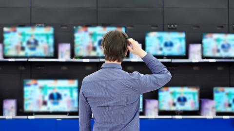 Man in TV shop