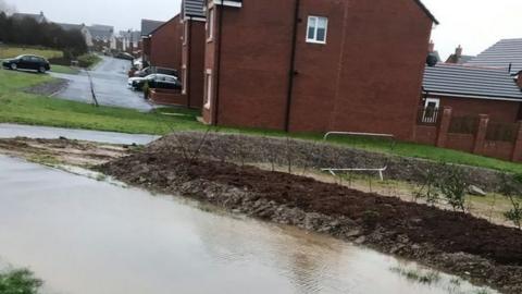 Flooded footpath at Parc Derwen in December 2019