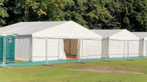 temporary classrooms and portaloos