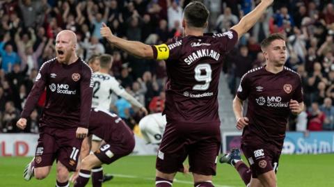 Cammy Devlin of Hearts celebrates