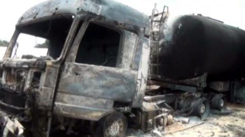 Burnt-out wreck of oil tanker near Kisantu, DR Congo (7 October)