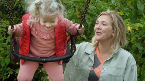 Anna Semenko with her daughter