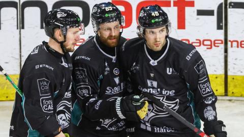 Belfast Giants players celebrate a goal