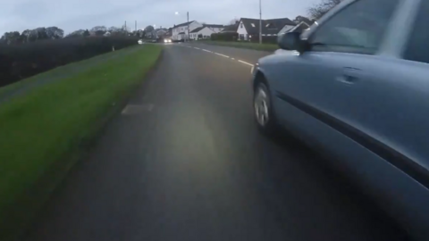 Photo taken from a plain-clothes police cyclist of a car passing too close