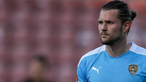 Jake Reeves in action for Stevenage