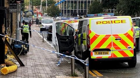 Police at the scene in Morley Street, Bradford