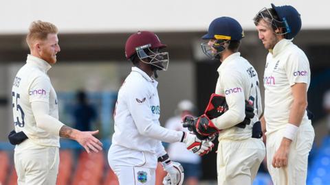 England and West Indies players shake hands after first Test