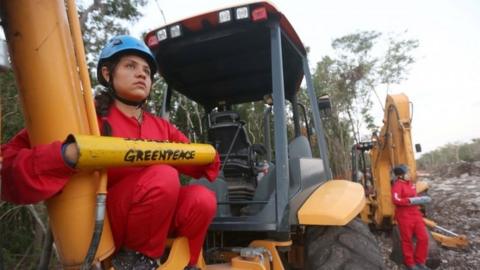 Activists of Greenpeace chain themselves to backhoes against the construction of section 5 of the Maya Train in Playa del Carmen, Quintana Roo state, Mexico, 28 March 2022