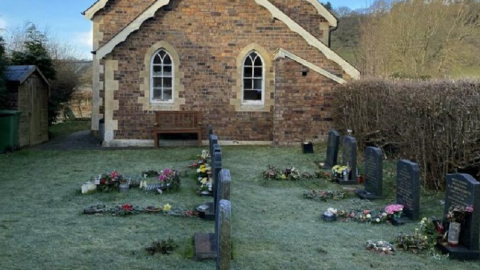 Graves outside chapel