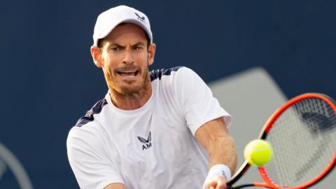 Andy Murray hits a return