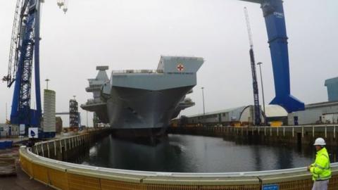 HMS Prince of Wales leaving Rosyth dock