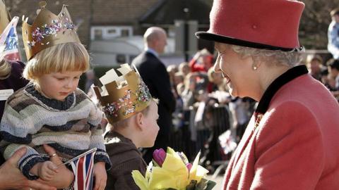 The Queen meeting a young boy