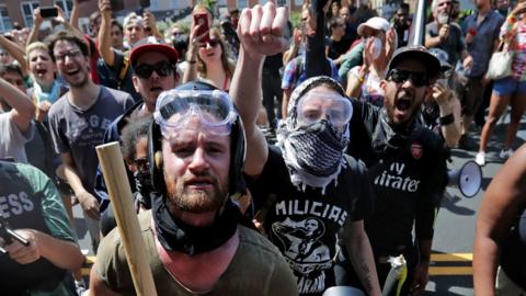 Anti-fascist counter-protesters wait outside Emancipation Park in Charlottesville, Virginia.