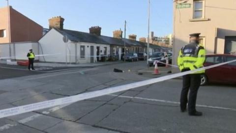 Gardaí (Irish police) at the scene of the shooting in Dublin's Eugene Street area