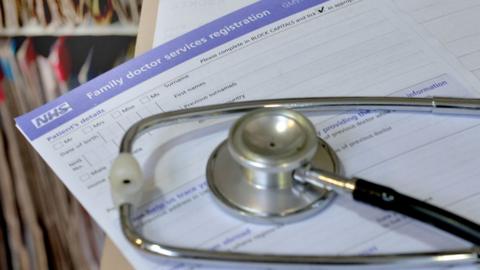 Stethoscope and patient registration form