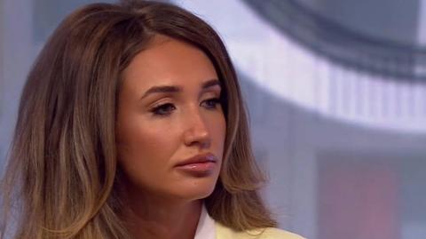 Reality TV star Megan McKenna had to make a video to disprove the claim.