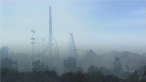 Amusement park clouded by smoke