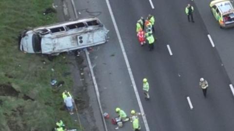 The overturned minibus on the A1M