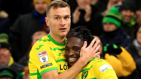 Ben Gibson congratulates Jonathan Rowe following Norwich's second goal