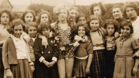 A group of young girls and women