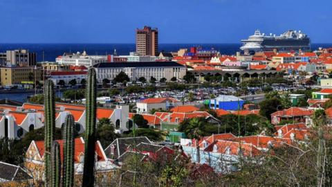 A cruise ship is seen in front of Willemstad's Bay in Curacao