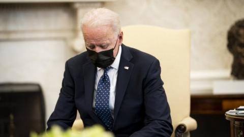 Image shows Joe Biden at the White House on Tuesday