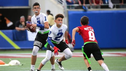 Children playing at the NFL Flag Football Championship in 2018.