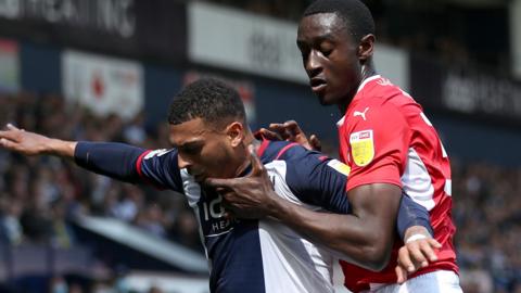 Jason Sraha (right) in action for Barnsley