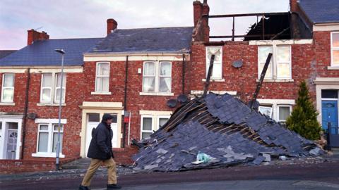 A house on Overhill terrace in Bensham Gateshead seen without its roof after strong winds from Storm Malik battered northern parts of the UK, on Sunday 30 January 2022