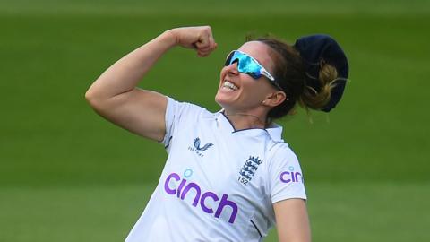 Kate Cross celebrates taking a catch