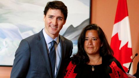 Newly appointed Veterans Affairs Minister Jody Wilson-Raybould poses with Prime Minister Justin Trudeau