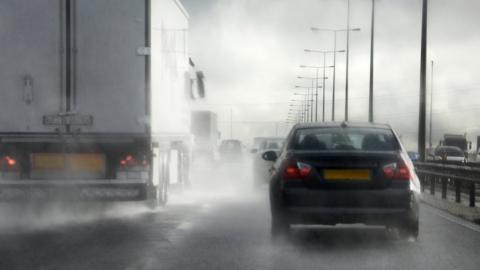 Traffic on road in rain