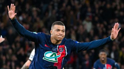 Kylian Mbappe celebrates scoring in the French Cup