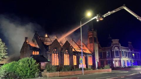 Firefighters battling blaze in Grimsby Road