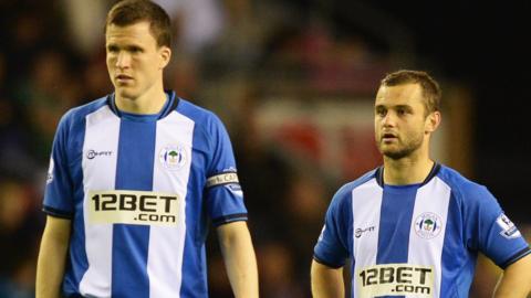 Gary Caldwell and Shaun Maloney playing for Wigan in 2013