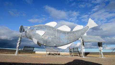 Sandhaven's Feed the Fish sculpture