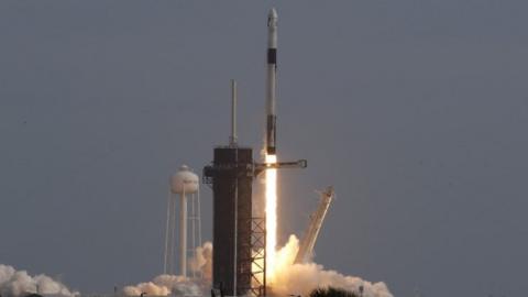 A SpaceX Falcon 9 rocket, carrying the Crew Dragon astronaut capsule, lifts off on an in-flight abort test from the Kennedy Space Center in Cape Canaveral