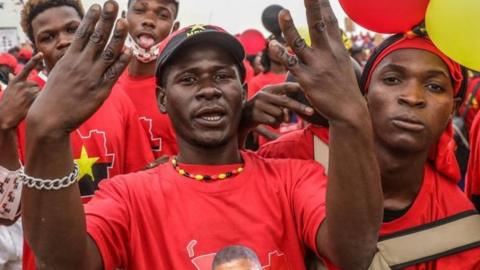 Supporters of incumbent president and People's Movement for the Liberation of Angola - Labour Party (MPLA) presidential candidate Joao Lourenco