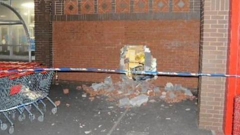 This is the moment a gang ripped an ATM through a branch of Aldi and made off with £66,000.