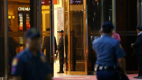 Philippine police secure an entrance of the Resorts World Manila hotel and casino complex in Pasay City, south of Manila, Philippines 2 June 2017.