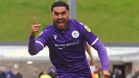 Stevenage's Jamie Reid celebrates his equaliser