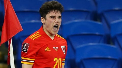 Daniel James celebrates