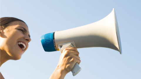 Woman with loudspeaker