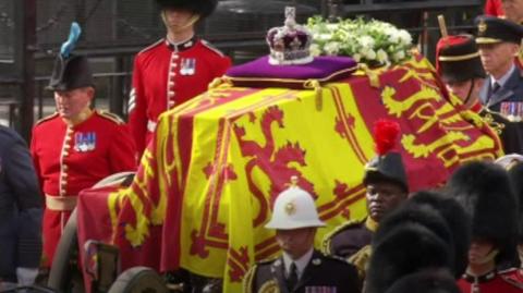 The Queen's coffin draped in the Royal Standard flag