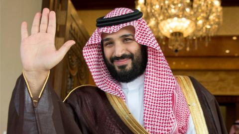 Saudi Deputy Crown Prince Mohammed bin Salman waves as he meets with Philippine President Rodrigo Duterte in Riyadh, Saudi Arabia, April 11, 201