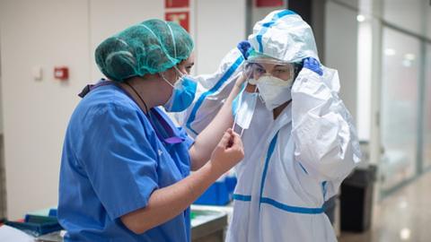 An intensive care doctor and a nurse in Spain