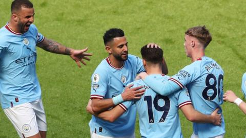 Man City players celebrate