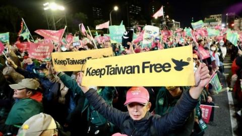 Supporters of Taiwanese Vice President and ruling Democratic Progressive Party presidential candidate for 2024 election William Lai (Lai Ching-te) and vice presidential candidate Hsiao Bi-khim, (both unseen) react during a campaign rally in front of the presidential building in Taipei, Taiwan, 11 January 2024.