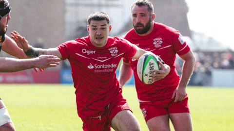 Jersey Reds players in action