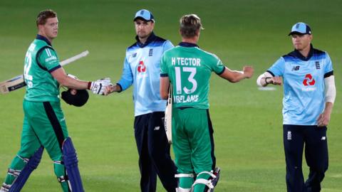 Ireland's Kevin O'Brien and Harry Tector shake hands with England players after the third ODI